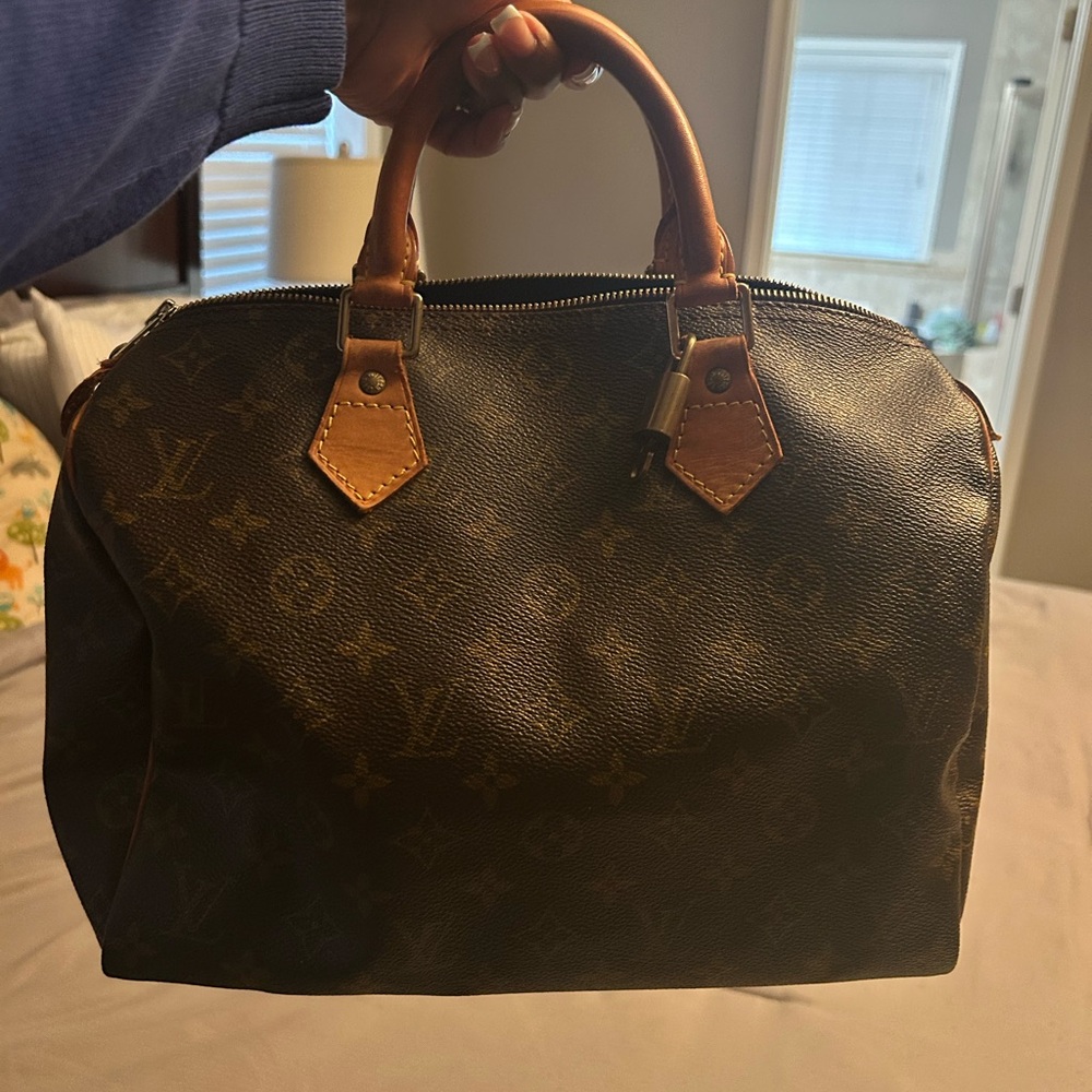 Louis Vuitton Brown and Gold Leather Detail